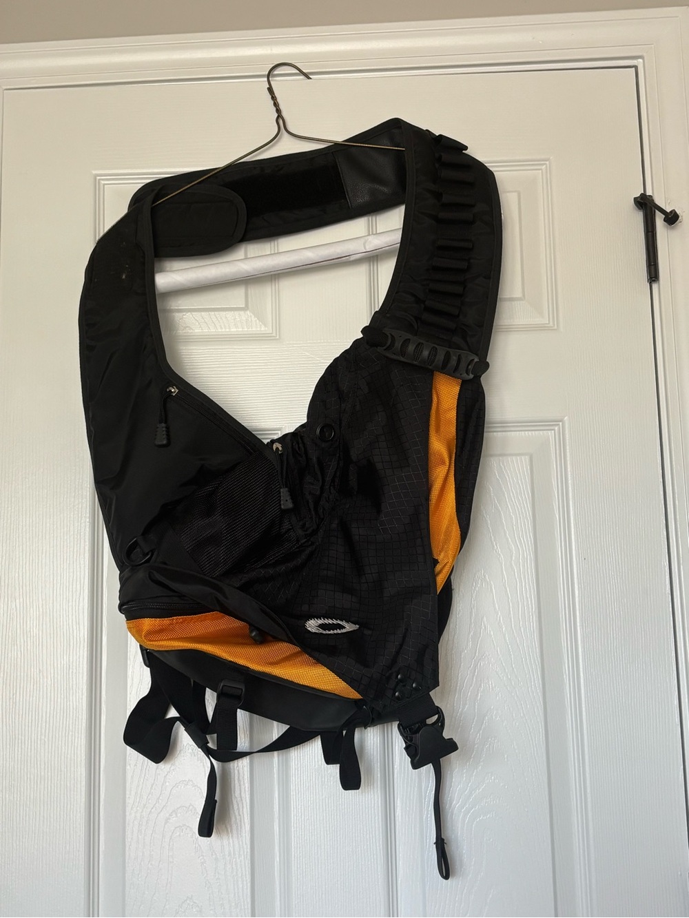 Vintage Oakley Black Sling Bag with Yellow Accents